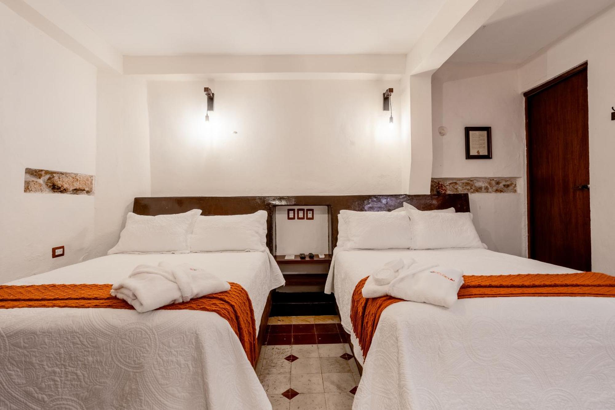 Kuxtal Boutique Hotel *