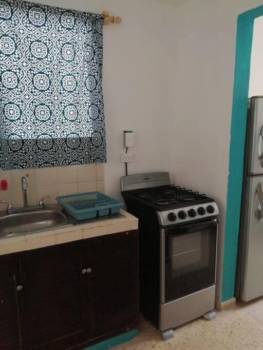 Casa Turquesa Enfrente De Parque Сasa de vacaciones